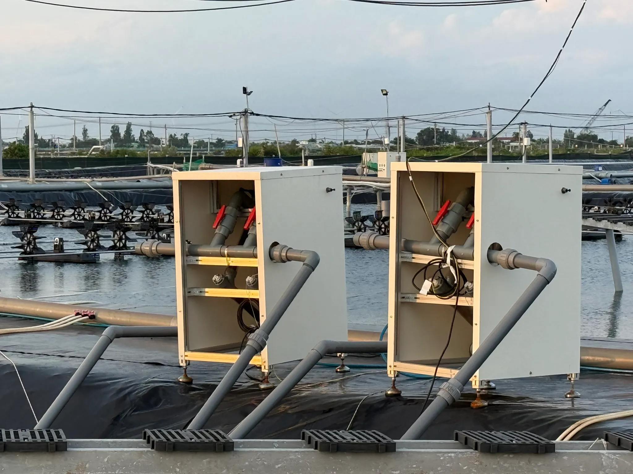 Nanobubble units installed at the edge of the pilot pond